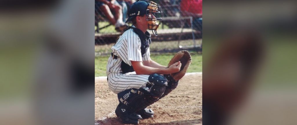 baseball catcher squatting, ready