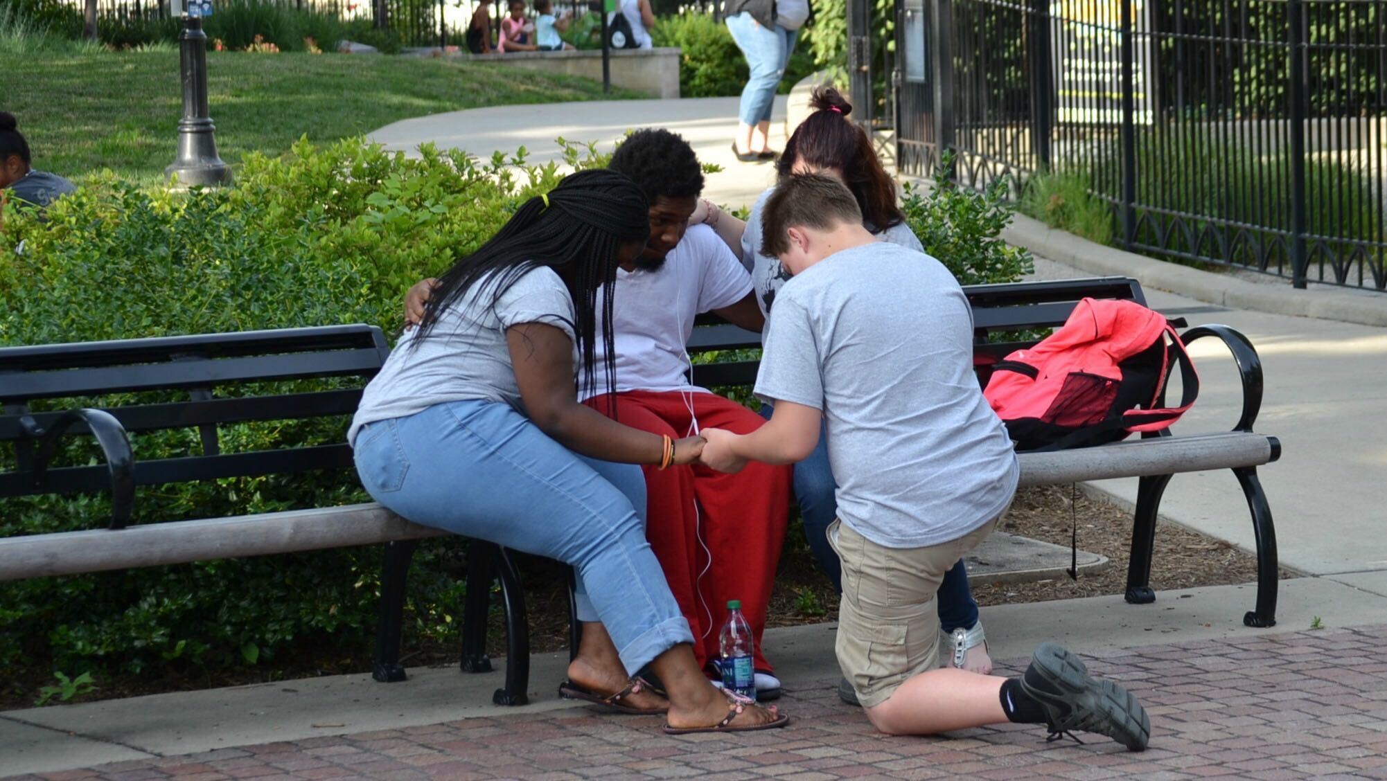 Young people praying together