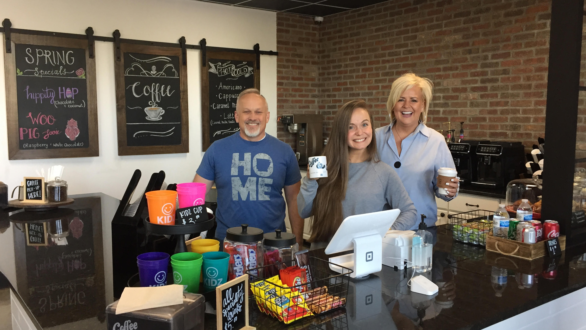 Pastor Sandra Tracy, Mary Grace Harper, and Doug Kramer at the Java Creek coffee shop inside Otter Creek Assembly of God Church.