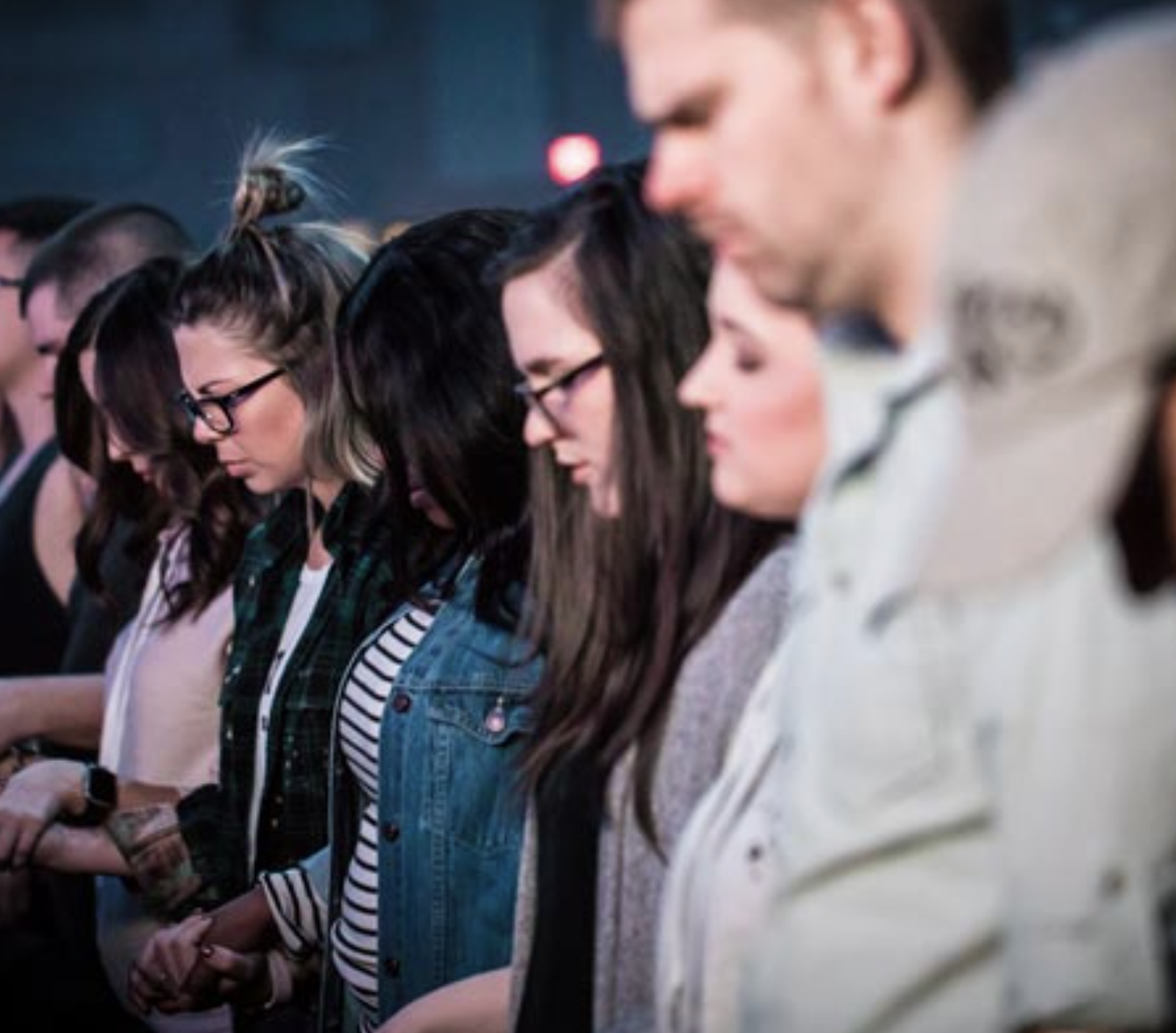 Group praying together at OneVoice event