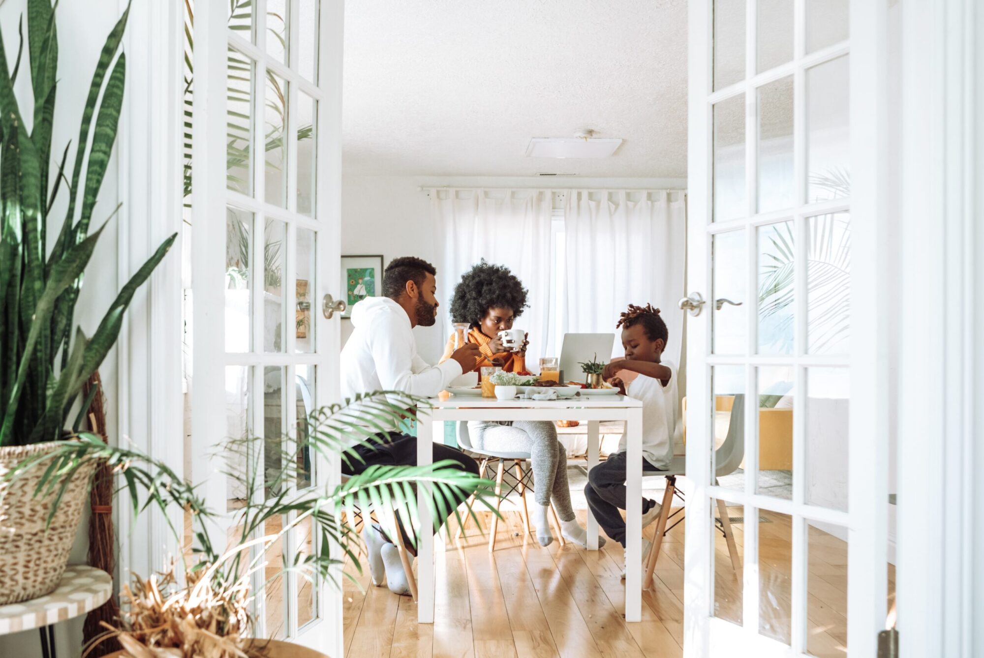 Family at the dinner table in an apartment