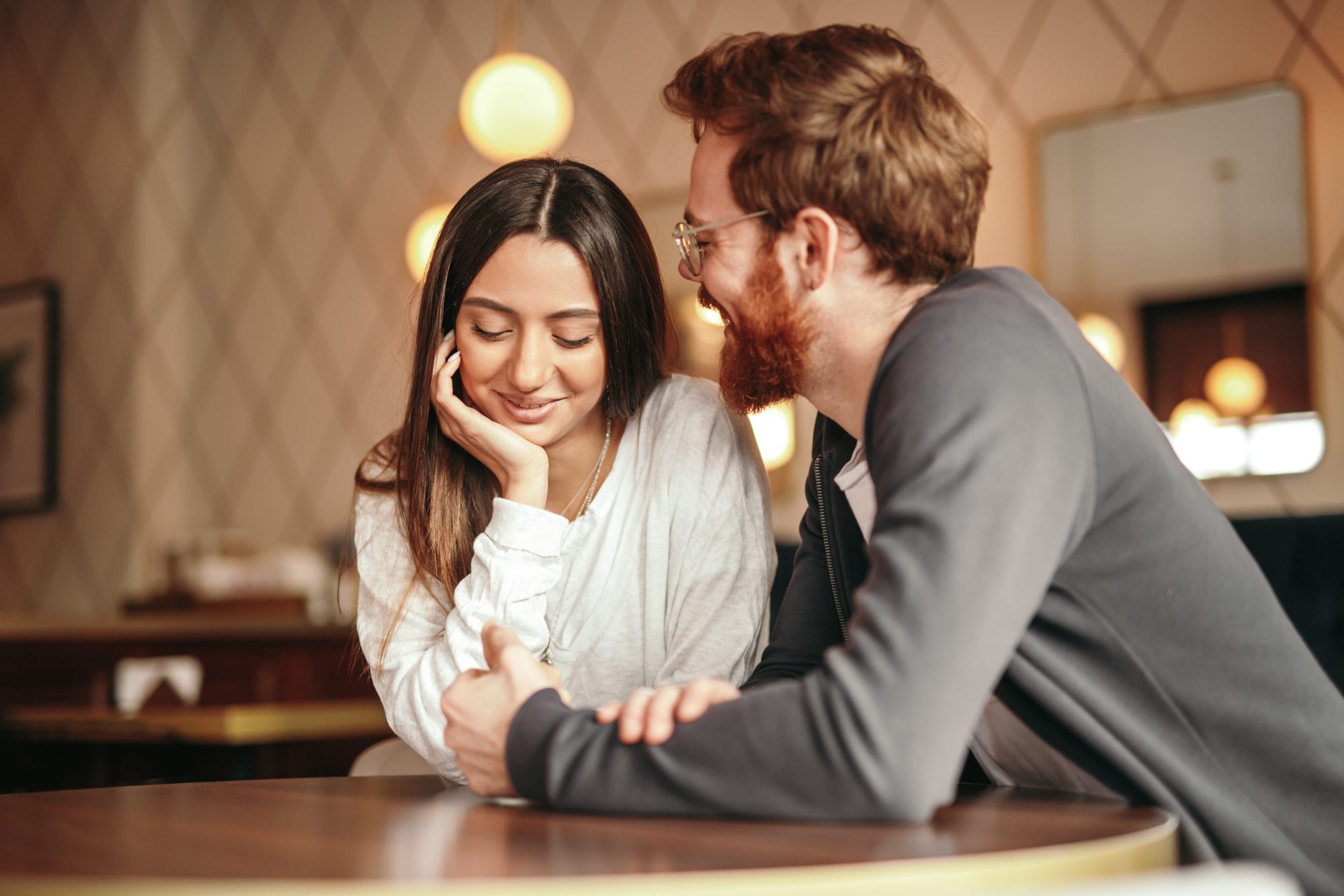 Couple sitting at table