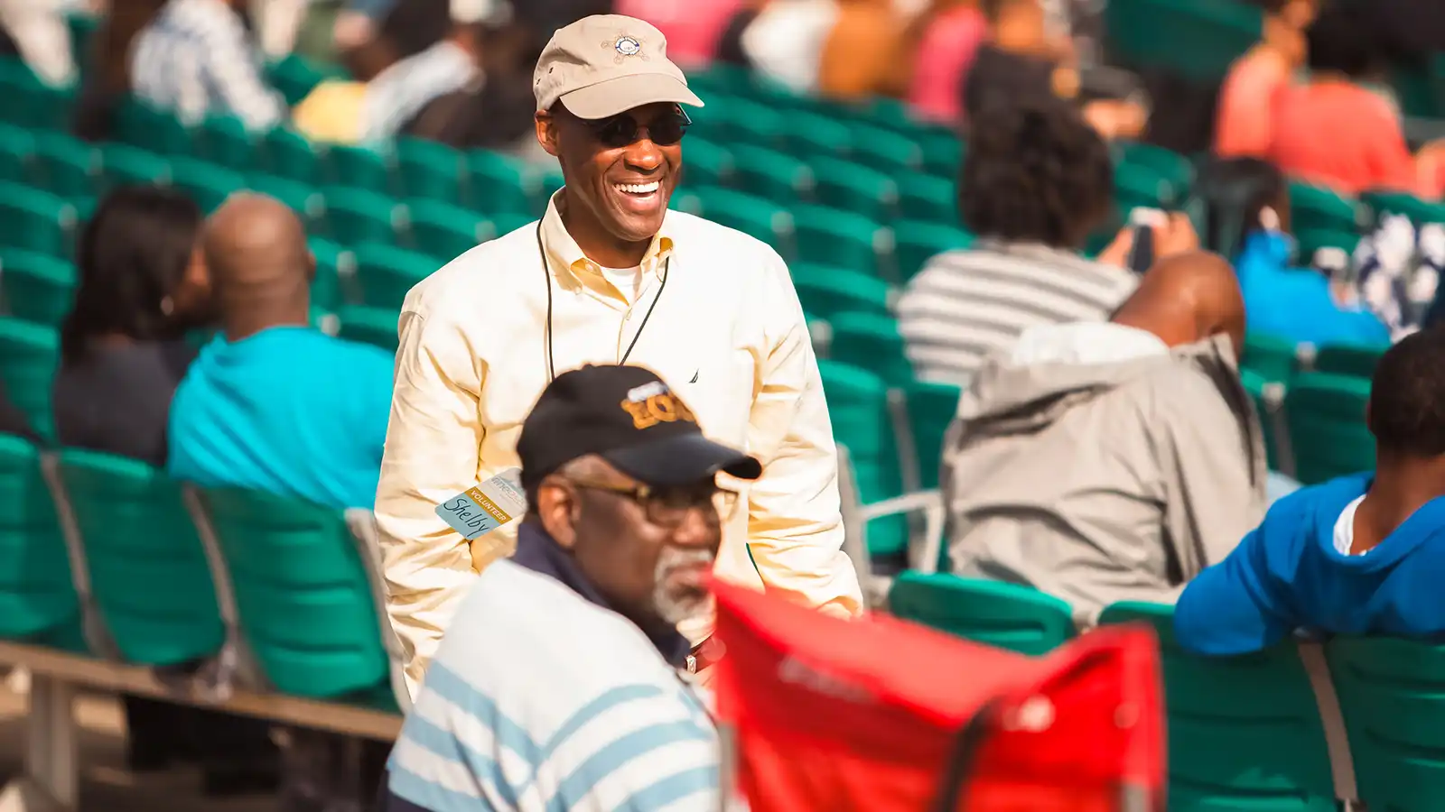 2 african-american men talking at event