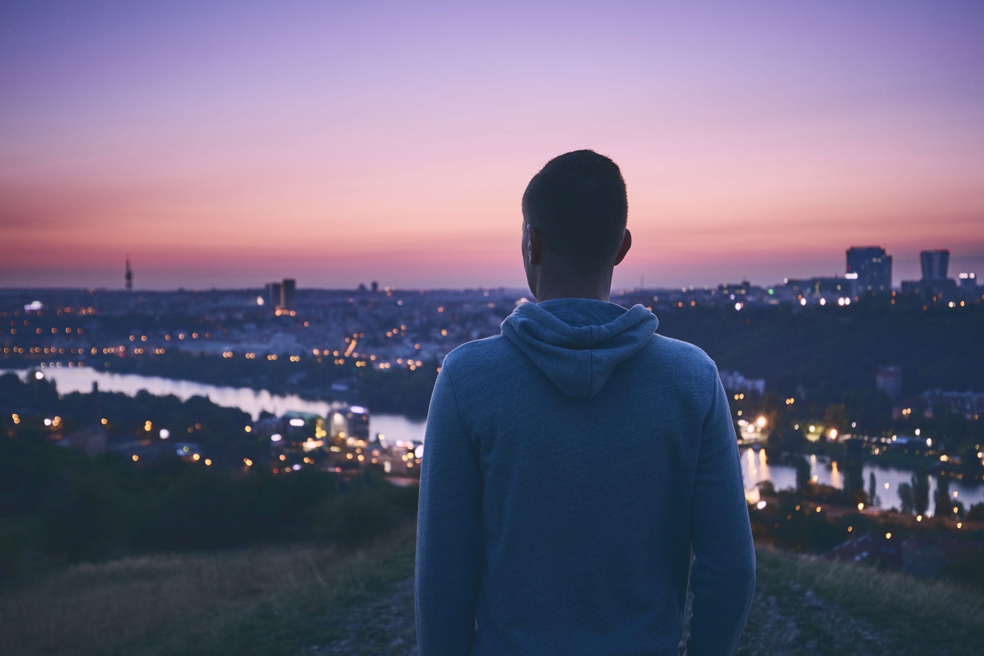 Man looking over cityscape